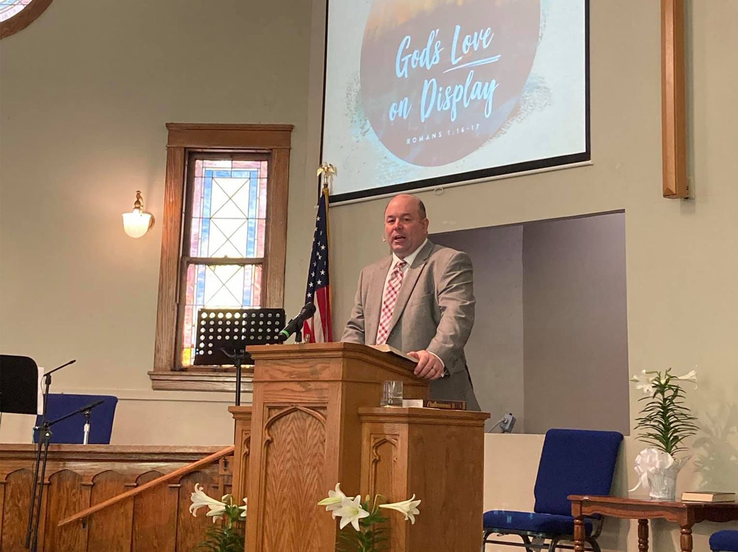 Pastor Smith preaching on Sunday Morning